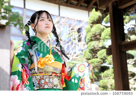 Adult furisode shoot, location shoot, cute hairstyle, Japanese woman in green kimono Adult furisode shoot, location shoot, cute hairstyle, Japanese woman in green kimono 108759093