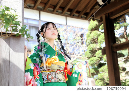Adult furisode shoot, location shoot, cute hairstyle, Japanese woman in green kimono Adult furisode shoot, location shoot, cute hairstyle, Japanese woman in green kimono 108759094
