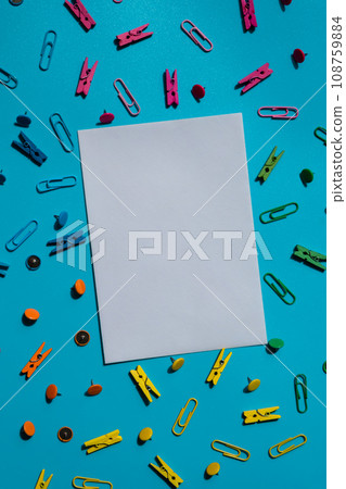 Frame border made of school stationery supplies and alarm clock. Copy space for your text or Educational greeting announcement for students and teacher. Creative vivid colorful background. Concept of 108759884