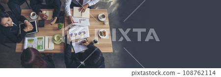 Banner top view business people meeting together at office desk in conference room. Panorama Team business meeting partnership plan brainstorm together. Team Collaborate partner group with copy space Banner top view business people meeting together at office desk in conference room. Panorama Team business meeting partnership plan brainstorm together. Team Collaborate partner group with copy space 108762114