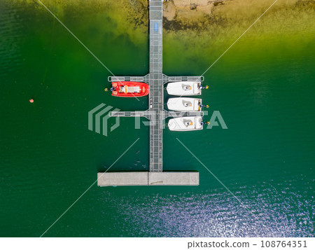 Marina Majesty: Aerial Top-Down of Docked Sailboats Marina Majesty: Aerial Top-Down of Docked Sailboats 108764351