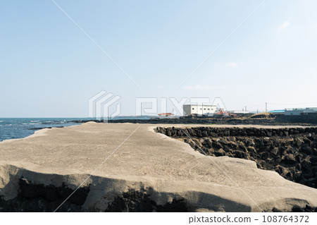 Seaside olle trail road and country house in Jeju island, Korea Seaside olle trail road and country house in Jeju island, Korea 108764372
