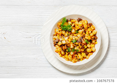 Beef Hash with roasted corn, garlic and parsley 108767578