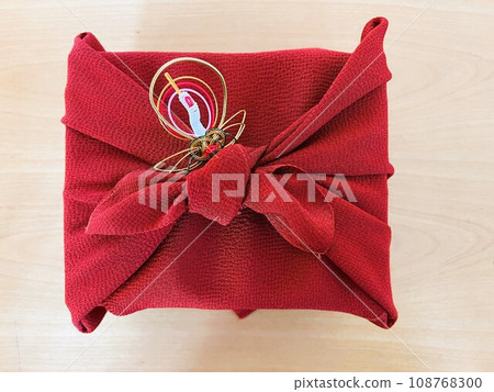 Furoshiki-wrapped gift with Mizuhiki crane Furoshiki-wrapped gift with Mizuhiki crane 108768300