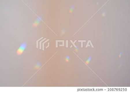 Rainbow highlights on a white wall. Rainbow highlights on a white wall. 108769250