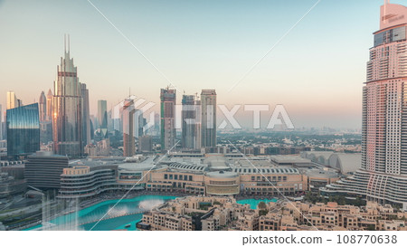 Aerial view of Dubai International Financial Centre district during sunset timelapse Aerial view of Dubai International Financial Centre district during sunset timelapse 108770638