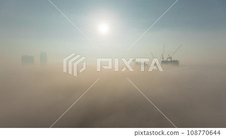 Modern city architecture in Business bay district before sunrise. Panoramic view of Dubai's skyscrapers all night timelapse 108770644
