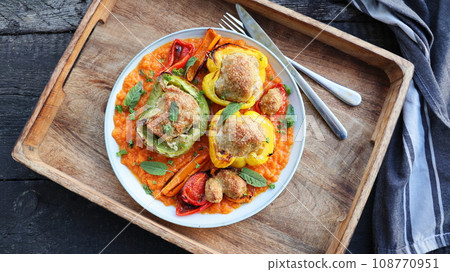 Stuffed bell peppers with couscous and beef meat. Top view 108770951