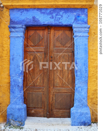 Beautiful wooden old door on Rhodes island in Greece 108771029