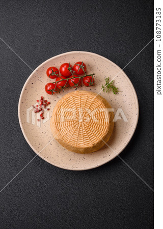 Delicious hard craft cheese made from cow or goat milk Delicious hard craft cheese made from cow or goat milk 108773185