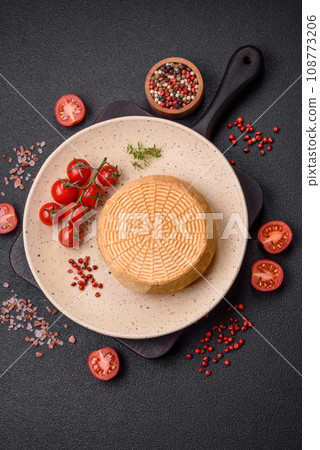 Delicious hard craft cheese made from cow or goat milk 108773206