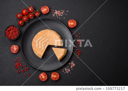 Delicious hard craft cheese made from cow or goat milk Delicious hard craft cheese made from cow or goat milk 108773217