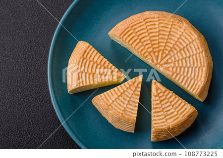 Delicious hard craft cheese made from cow or goat milk Delicious hard craft cheese made from cow or goat milk 108773225