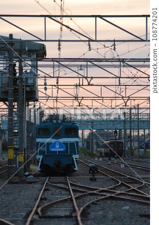 Express "Mimine 51" resting at the depot after work with the sunrise sky in the background_Photo taken on November 11, 2023 108774201