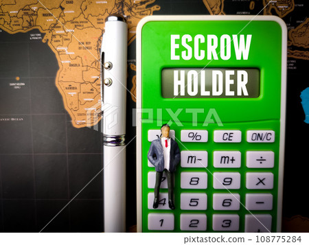 Calculator,miniature people and pen with text ESCROW HOLDER on a world map background Calculator,miniature people and pen with text ESCROW HOLDER on a world map background 108775284