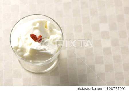 An overhead shot of the almond tofu in the dessert cup 108775991