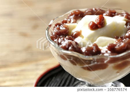 Almond tofu and plenty of red bean paste in a dessert cup Almond tofu and plenty of red bean paste in a dessert cup 108776574