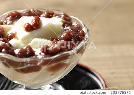 Almond tofu and plenty of red bean paste in a dessert cup Almond tofu and plenty of red bean paste in a dessert cup 108776575