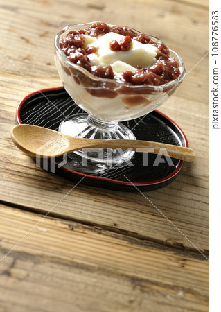 Almond tofu and plenty of red bean paste in a dessert cup Almond tofu and plenty of red bean paste in a dessert cup 108776583