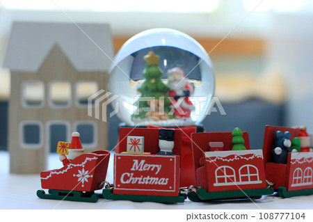 Snow Globe with Santa Claus. Christmas or New Year gift, Close up view, selective focus Snow Globe with Santa Claus. Christmas or New Year gift, Close up view, selective focus 108777104