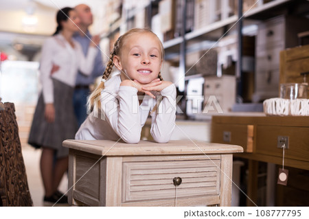 girl is satisfied of the comfortable furniture 108777795