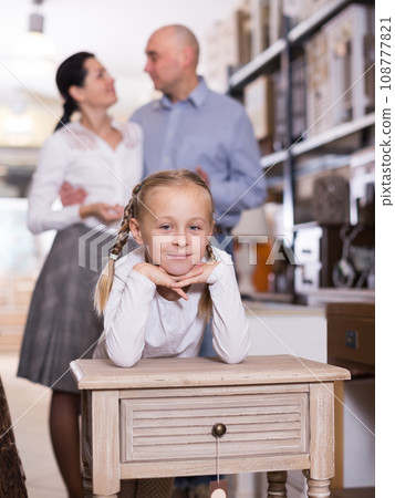 child is satisfied of the new furniture child is satisfied of the new furniture 108777821