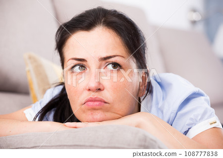 Gloomy adult female depression at home 108777838
