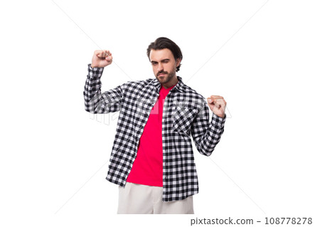 young caucasian handsome guy with a beard and chic hair on a white background with copy space young caucasian handsome guy with a beard and chic hair on a white background with copy space 108778278