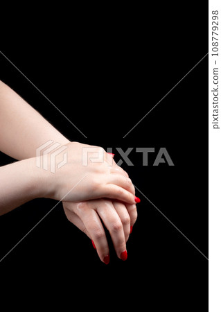 Women's hands rub disinfectant gel over their palms. Women's hands rub disinfectant gel over their palms. 108779298