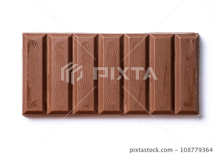 Traditional pieces of delicious Christmas chocolate nougat isolated on white background Traditional pieces of delicious Christmas chocolate nougat isolated on white background 108779364