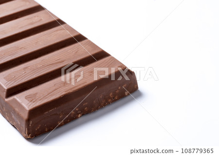 Traditional pieces of delicious Christmas chocolate nougat isolated on white background 108779365