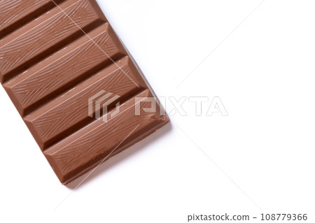 Traditional pieces of delicious Christmas chocolate nougat isolated on white background Traditional pieces of delicious Christmas chocolate nougat isolated on white background 108779366