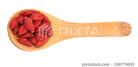 Dried goji berries in wooden spoon isolated on white background. Top view. Flat lay. 108779691