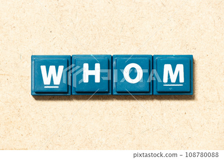 Tile alphabet letter in word whom on wood background Tile alphabet letter in word whom on wood background 108780088