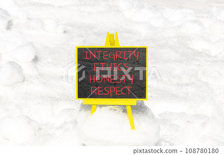Integrity ethics honesty respect symbol. Concept word Integrity Ethics Honesty Respect on beautiful blackboard. Beautiful white snow background. Business integrity ethics honesty respect concept. Integrity ethics honesty respect symbol. Concept word Integrity Ethics Honesty Respect on beautiful blackboard. Beautiful white snow background. Business integrity ethics honesty respect concept. 108780180