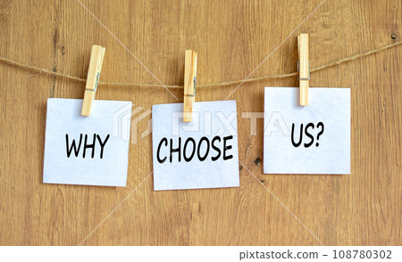 Why choose us symbol. Concept word Why choose us on beautiful white paper on wooden clothespin. Beautiful wooden table wooden background. Business motivational why choose us concept. Copy space. Why choose us symbol. Concept word Why choose us on beautiful white paper on wooden clothespin. Beautiful wooden table wooden background. Business motivational why choose us concept. Copy space. 108780302
