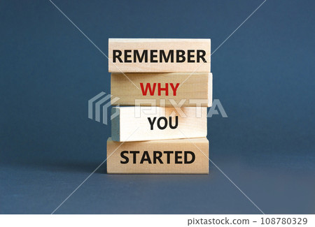 Remember why you started symbol. Concept word Remember why you started on wooden block. Beautiful grey table grey background. Business remember why you started concept. Copy space. 108780329