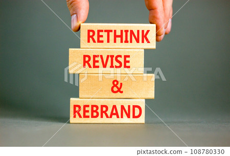 Rethink revise rebrand symbol. Concept word Rethink Revise and Rebrand on beautiful block. Beautiful white background. Business brand motivational rethink revise rebrand concept. Copy space. 108780330