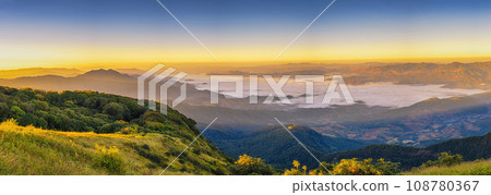 Tropical forest nature landscape view with mountain range and moving cloud mist at Kew Mae Pan nature trail, Doi Inthanon, Chiang Mai Thailand panorama Tropical forest nature landscape view with mountain range and moving cloud mist at Kew Mae Pan nature trail, Doi Inthanon, Chiang Mai Thailand panorama 108780367
