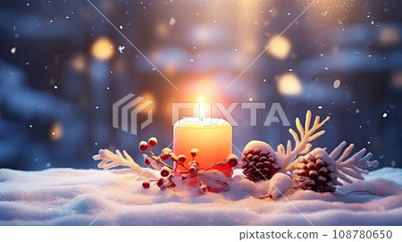 glowing candle in snow glowing candle in snow 108780650