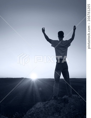 Happy man pray to God 108781205
