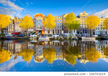 Amsterdam in the fall time. Capital of the Netherlands. View of old houses and the canal. Amsterdam in the fall time. Capital of the Netherlands. View of old houses and the canal. 108781624