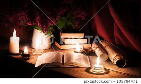 Still life from ancient book and lush boquet 108784471