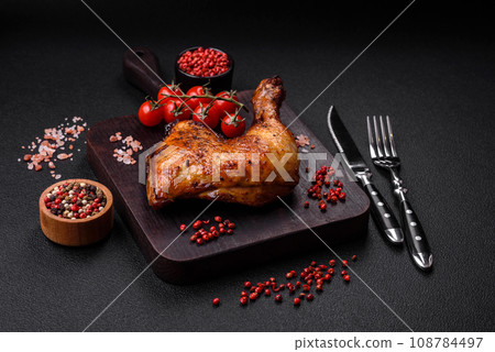 Delicious grilled chicken leg or quarter with salt and spices 108784497