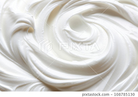 White texture of whipped cream, homemade sour cream or hand cream. Detailed pure creamy background White texture of whipped cream, homemade sour cream or hand cream. Detailed pure creamy background 108785130