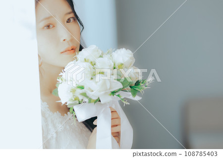 Young woman with bouquet Young woman with bouquet 108785403