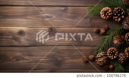 Christmas background with fir tree and decoration on dark wooden board Christmas background with fir tree and decoration on dark wooden board 108786276