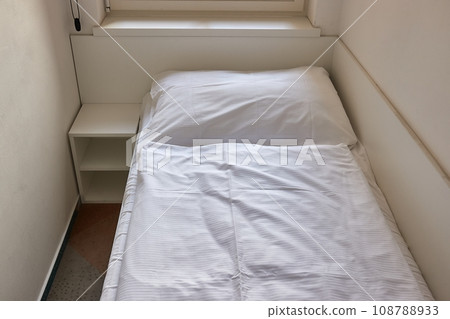 Hotel bed closeup 108788933