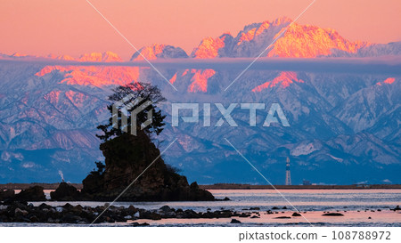 Tateyama mountain range (Tsurugi-dake) at dusk as seen from the Amaharashi coast Tateyama mountain range (Tsurugi-dake) at dusk as seen from the Amaharashi coast 108788972