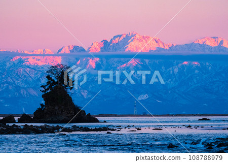 Tateyama mountain range (Tsurugi-dake) at dusk as seen from the Amaharashi coast Tateyama mountain range (Tsurugi-dake) at dusk as seen from the Amaharashi coast 108788979